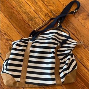 Navy and white striped duffel bag